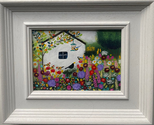 Bird Feeder By The Shed